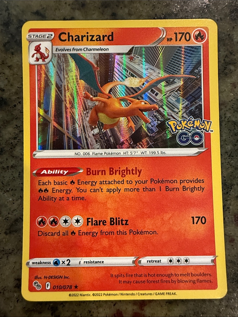 Pokemon Charizard Trading Card - Orange, Yellow, Red